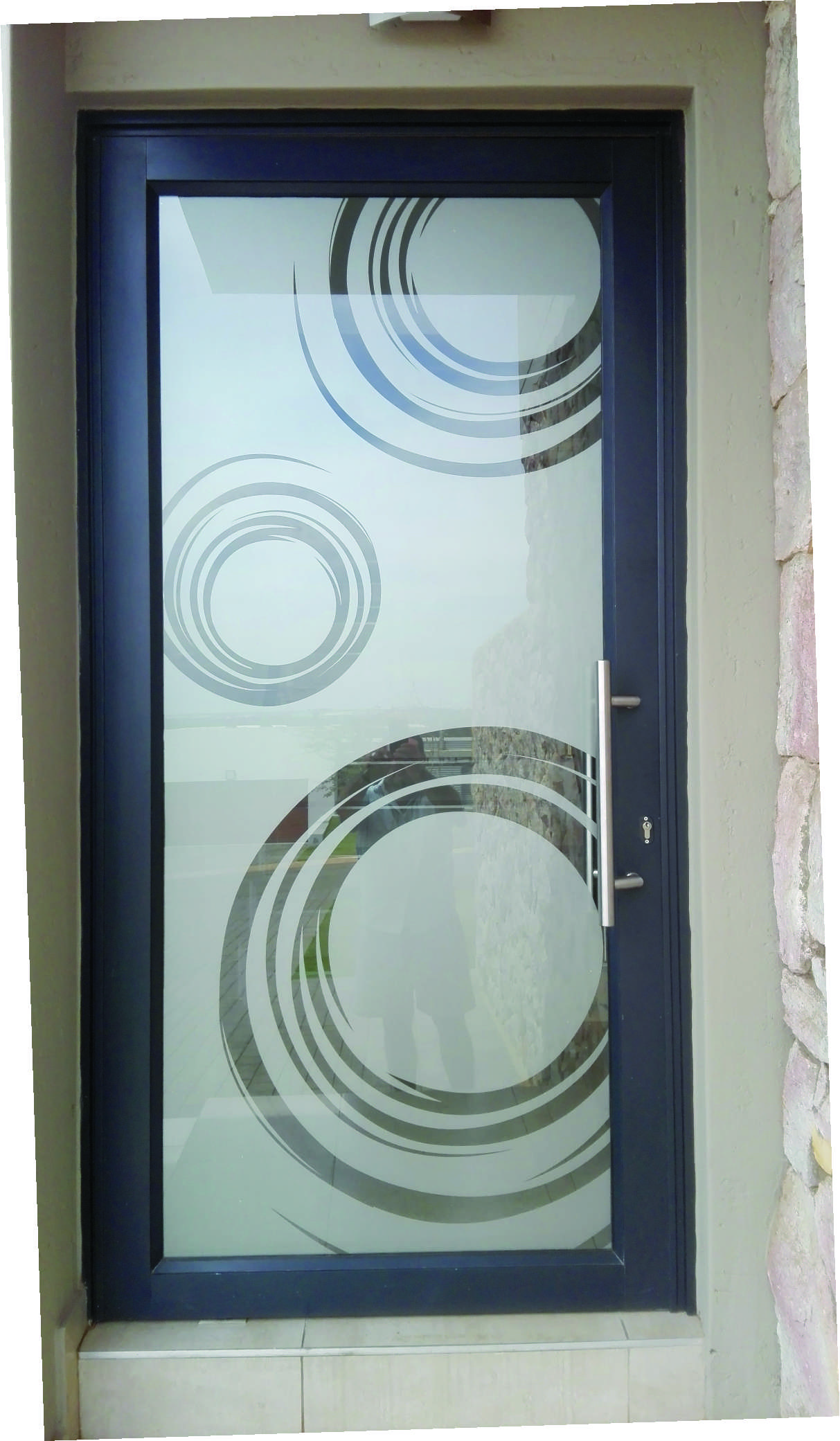 Sandblast vinyl effect installed on glass panels